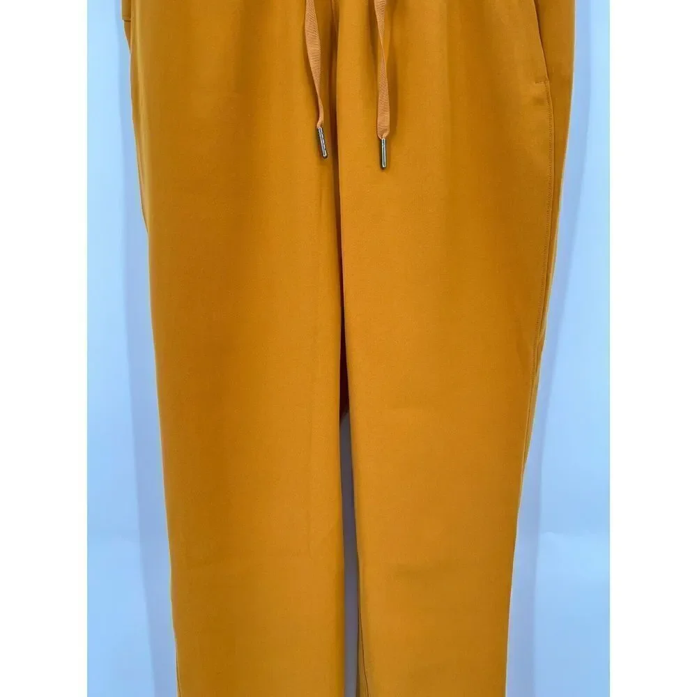 Lululemon On the Fly 7/8 Pant Woven Vintage Gold Mustard Yellow Women’s Size 4